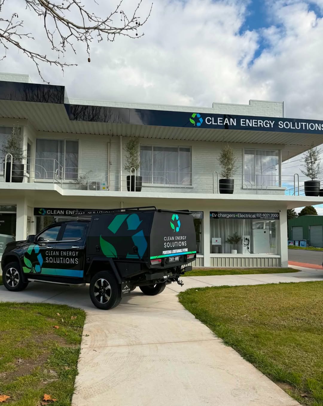 The Clean Energy Solutions shopfront on Elgin Boulevard, Wodonga, with a CES ute parked out the front